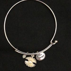 Avon precious charms shell bracelet